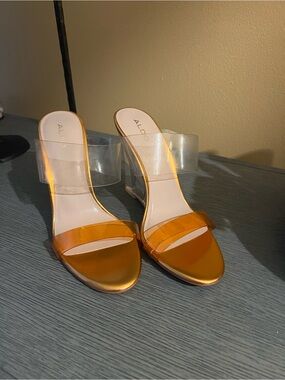 Aldo Metallic Orange Clear Strap Heeled Mules